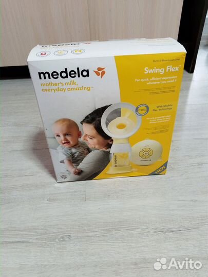 Молокоотсос medela электрический