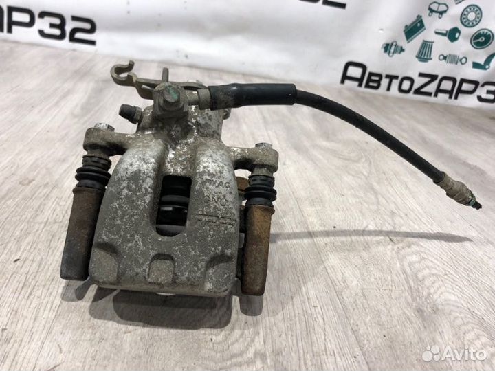 Суппорт тормозной задний правый Skoda Octavia A7