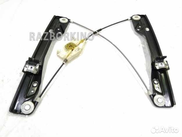 Стеклоподъемник электрический передний левый 7T4Z7