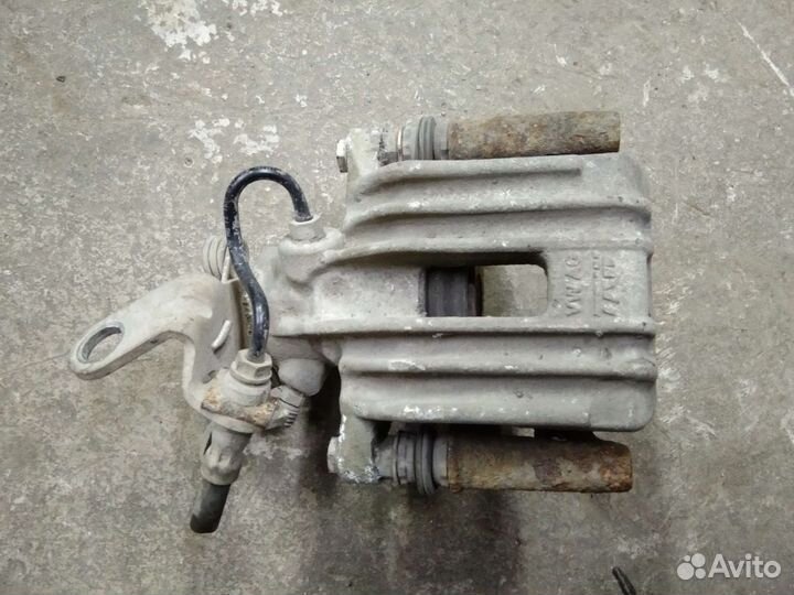 Суппорт задний Шкода Октавия A5