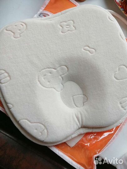 Анатомическая подушка для новорожденных