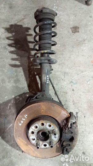 Поворотный кулак с амортизатором Volkswagen Passat