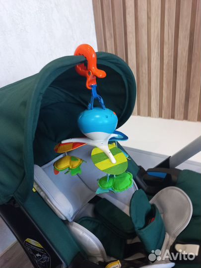Автокресло-коляска на колесах