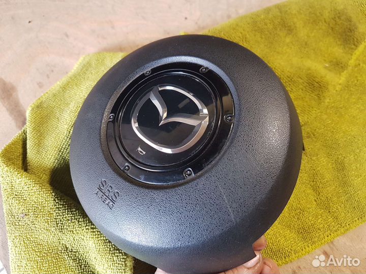 Подушка безопасности водителя mazda cx7 L3