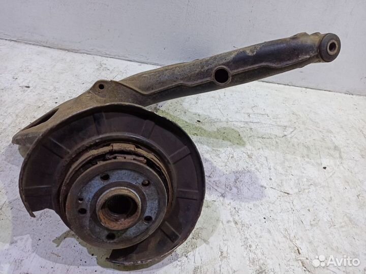 Рычаг задний левый