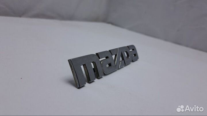 Эмблема задняя Mazda Familia BJ 1.5 ZL 2002