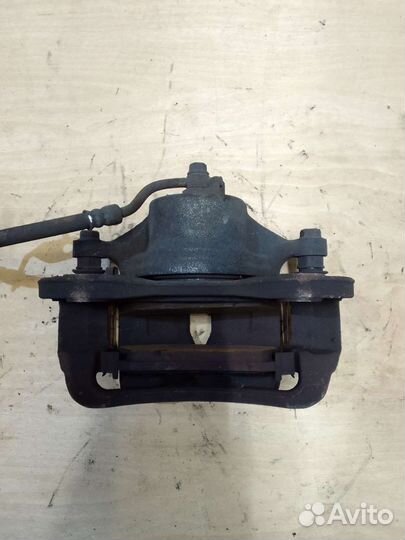 Суппорт передний левый Kia Sportage 3 10-16г