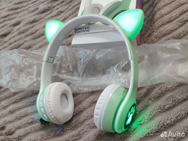 Новые беспроводные наушники с ушками