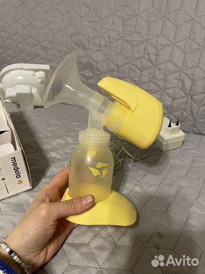 Молокоотсос medela mini electric
