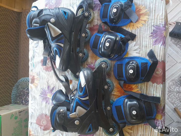 Роликовые коньки