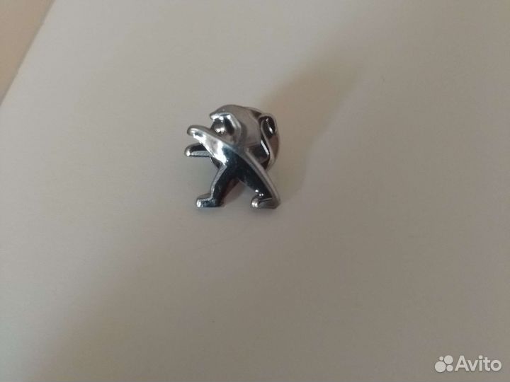 Пежо значок