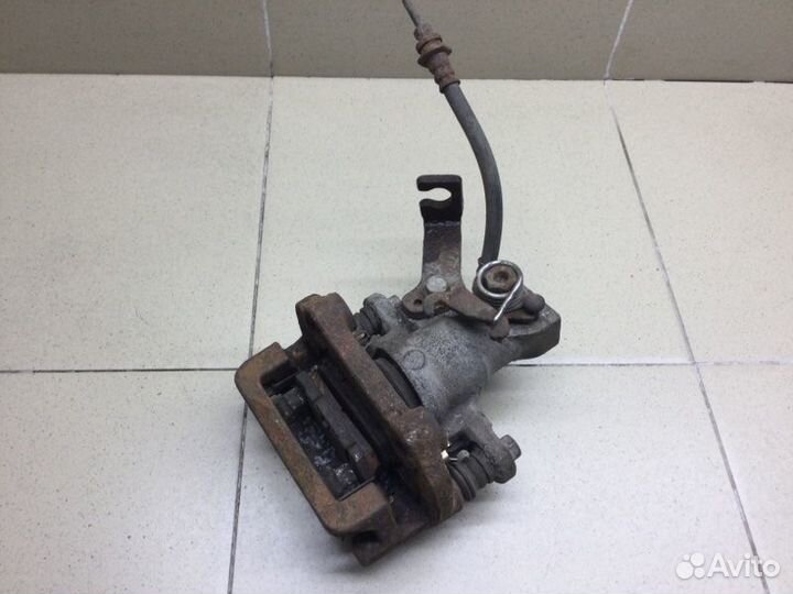 Суппорт тормозной задний задний правый Suzuki Sx4