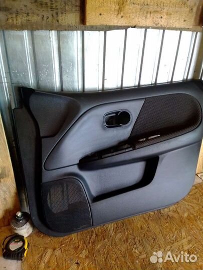 Обшивка двери Nissan Note 11