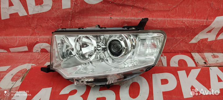 Фара левая Mitsubishi Pajero/Montero Sport