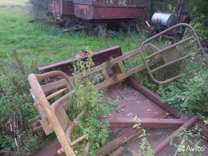 Захват для рулонов сена