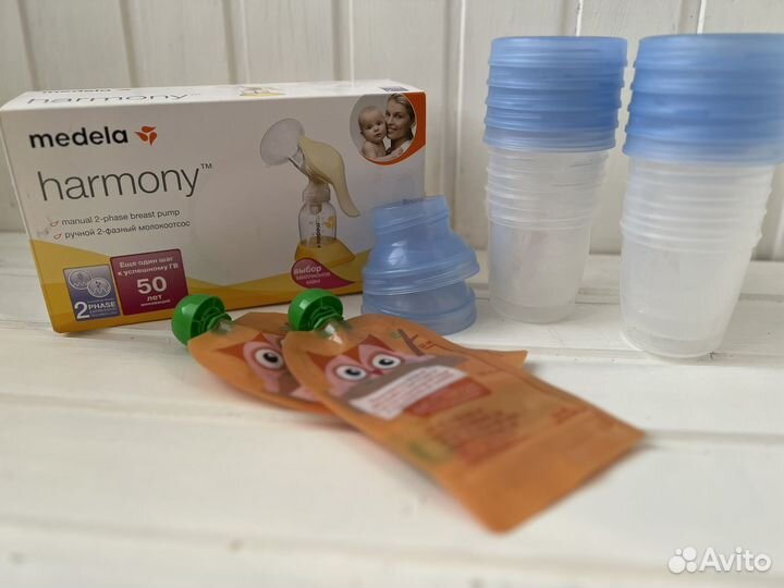 Молокоотсос ручной Medela + банки Avent + паучи