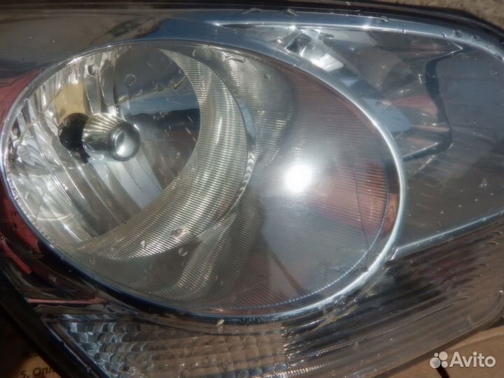 Стекло фары правой Opel Antara