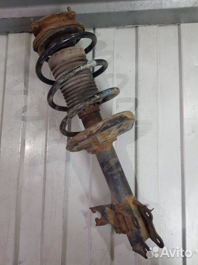 Амортизатор передний левый Nissan Almera Classic