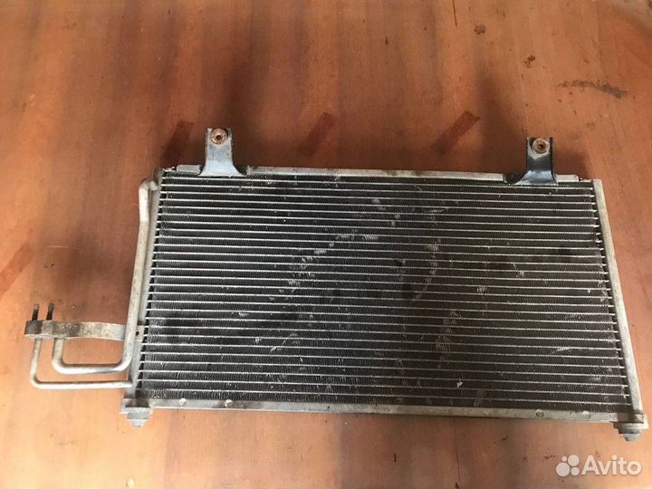 Радиатор кондиционера (конденсер) Kia Spectra