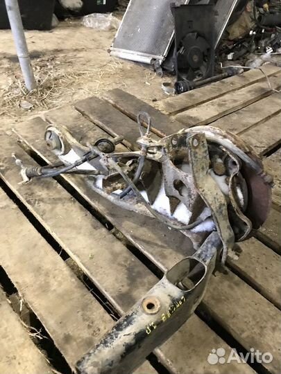 Кулак задний правый Mitsubishi Lancer