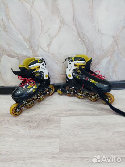 Роликовые коньки