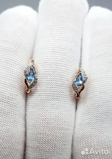 Золотые серьги с камнем