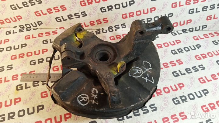 Кулак поворотный ER R в сборе б/у CX-7