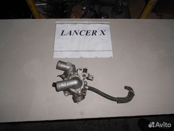 Mitsubishi lancer X Термостат