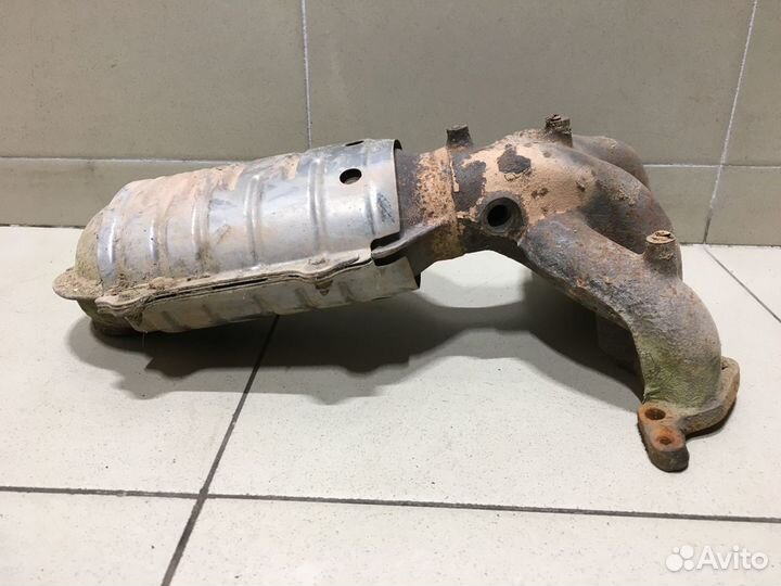 Коллектор выпускной RIO 2000-2004