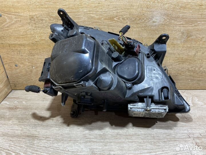 Фара левая Opel Vectra C дорест адаптивная 142573