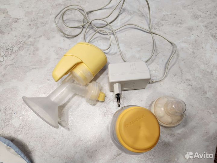 Молокоотсос электрич. Medela+соска Calma/medela