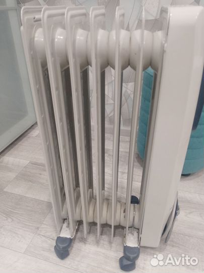 Масляный обогреватель delonghi