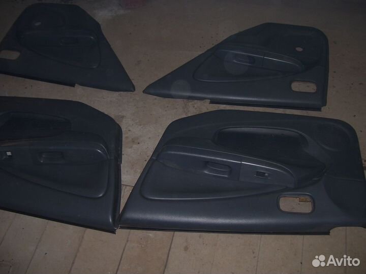 Ниссан альмера обшивки дверей