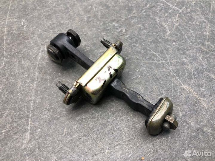 Ограничитель двери задний левый Ford Focus DNW