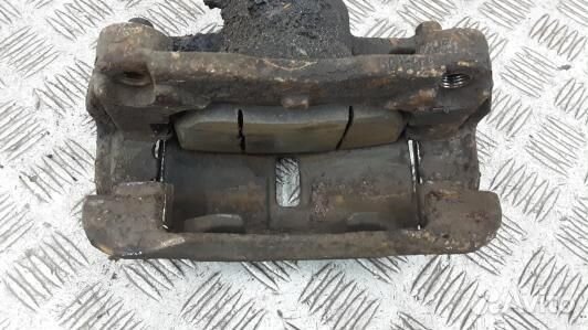 Суппорт тормозной передний левый nissan qashqai J1