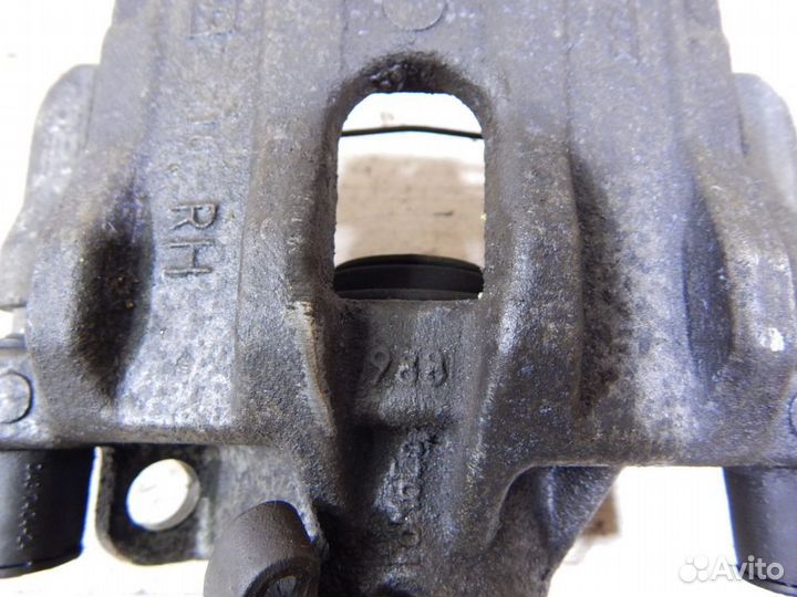 Суппорт задний правый Ford Focus 2