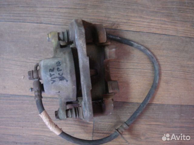 Суппорт тормозной правый Toyota 47730-52010