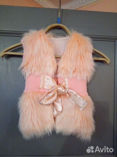 Меховая жилетка