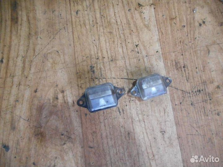 Фонарь номерного знака Suzuki Baleno 1995-1998