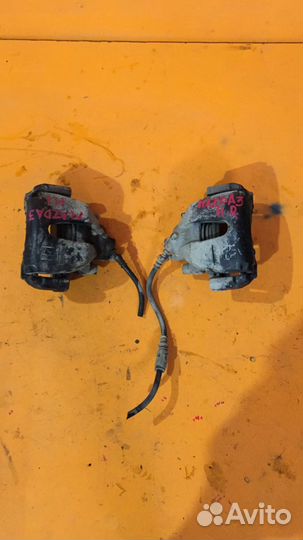 Суппорт тормозной передний на Mazda 3 BK