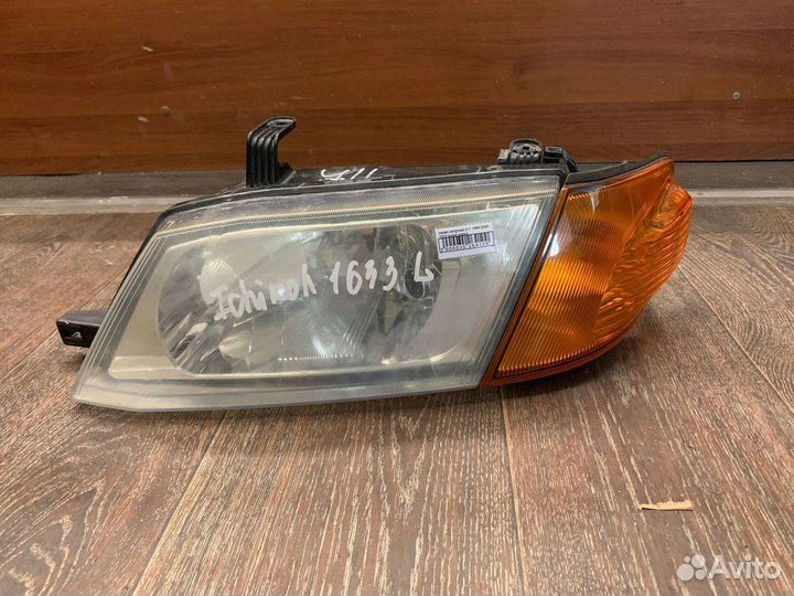 Фара левая Nissan ad y11