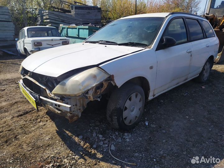 Кулак поворотный в сборе Nissan Wingroad WFY11 QG1