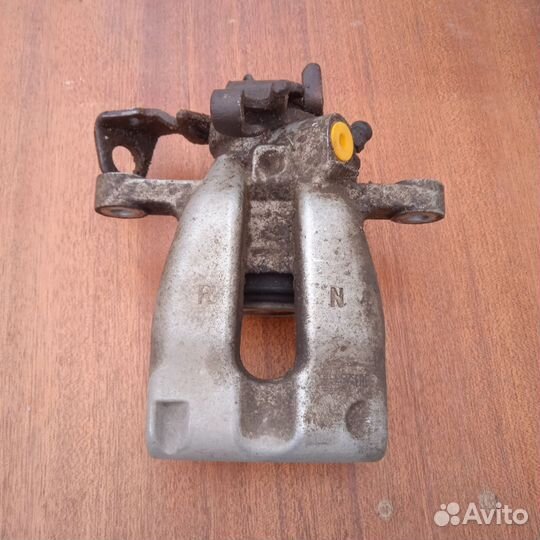 Суппорт тормозной задний