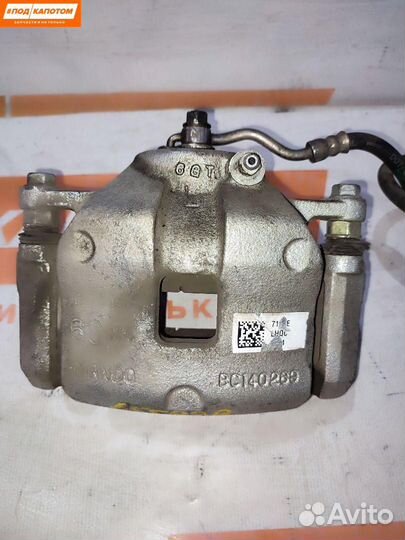 Суппорт тормозной передний левый Kia Sportage 4