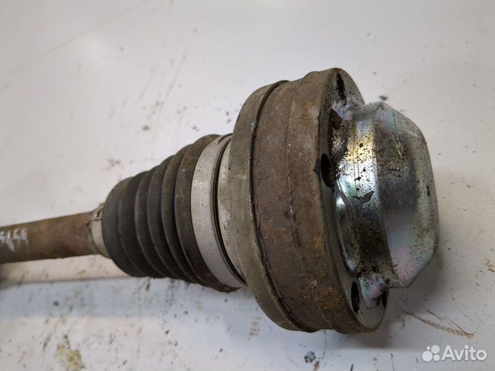 Полуось левая передняя Volkswagen Caddy