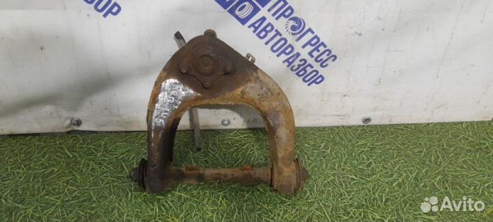 Рычаг подвески верхний левый Mitsubishi Pajero