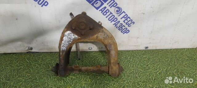 Рычаг подвески верхний левый Mitsubishi Pajero