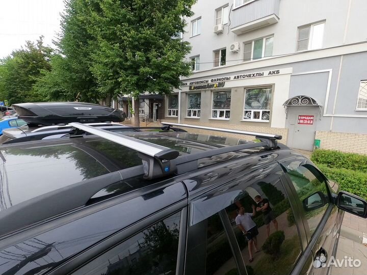 Поперечины Интер Титан крыло с замком на рейлинги