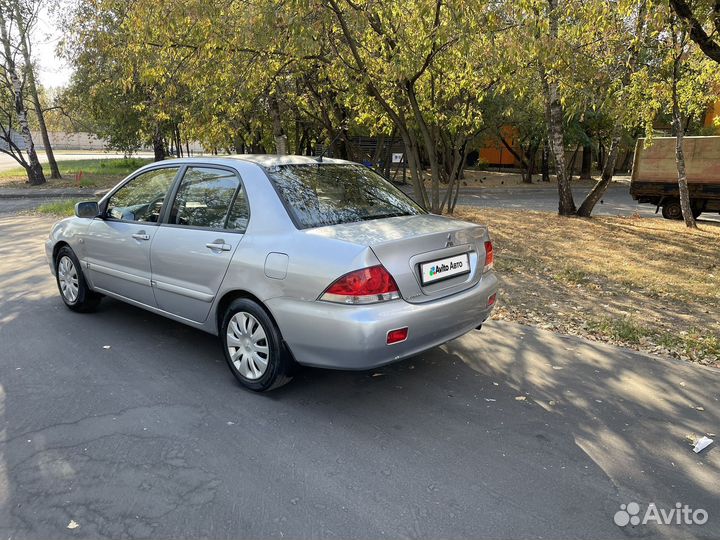 Mitsubishi Lancer 1.6 МТ, 2006, 165 480 км