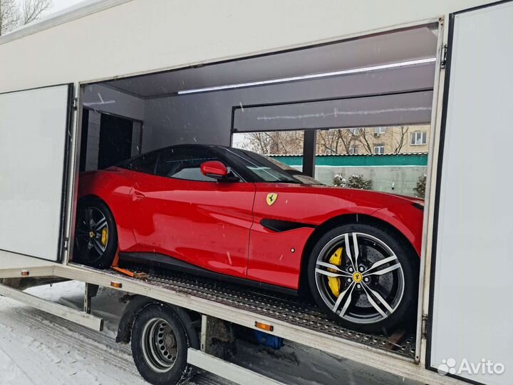 Крытый эвакуатор автовоз